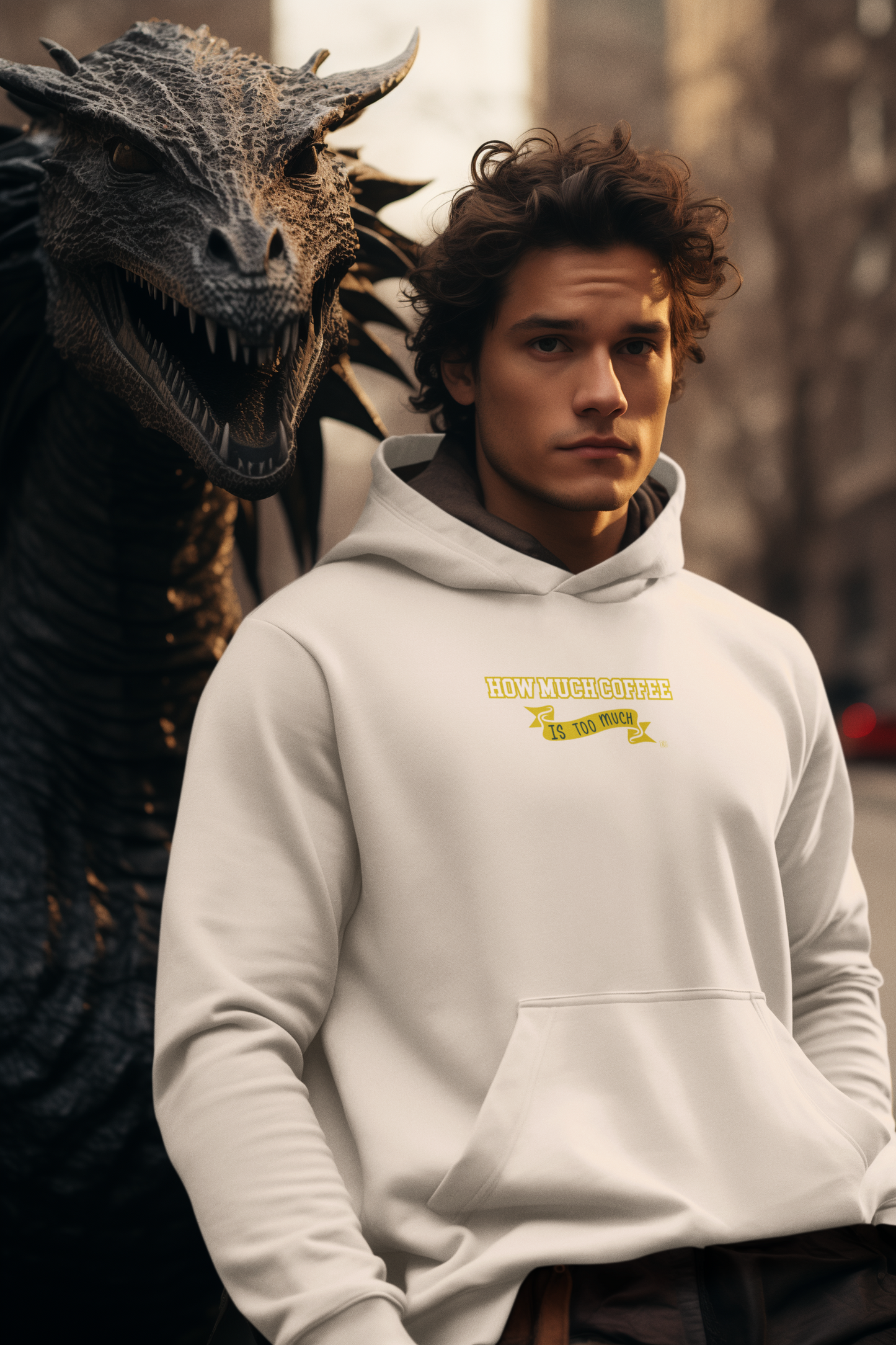 Person wearing a hoodie with text next to a dragon-like creature.