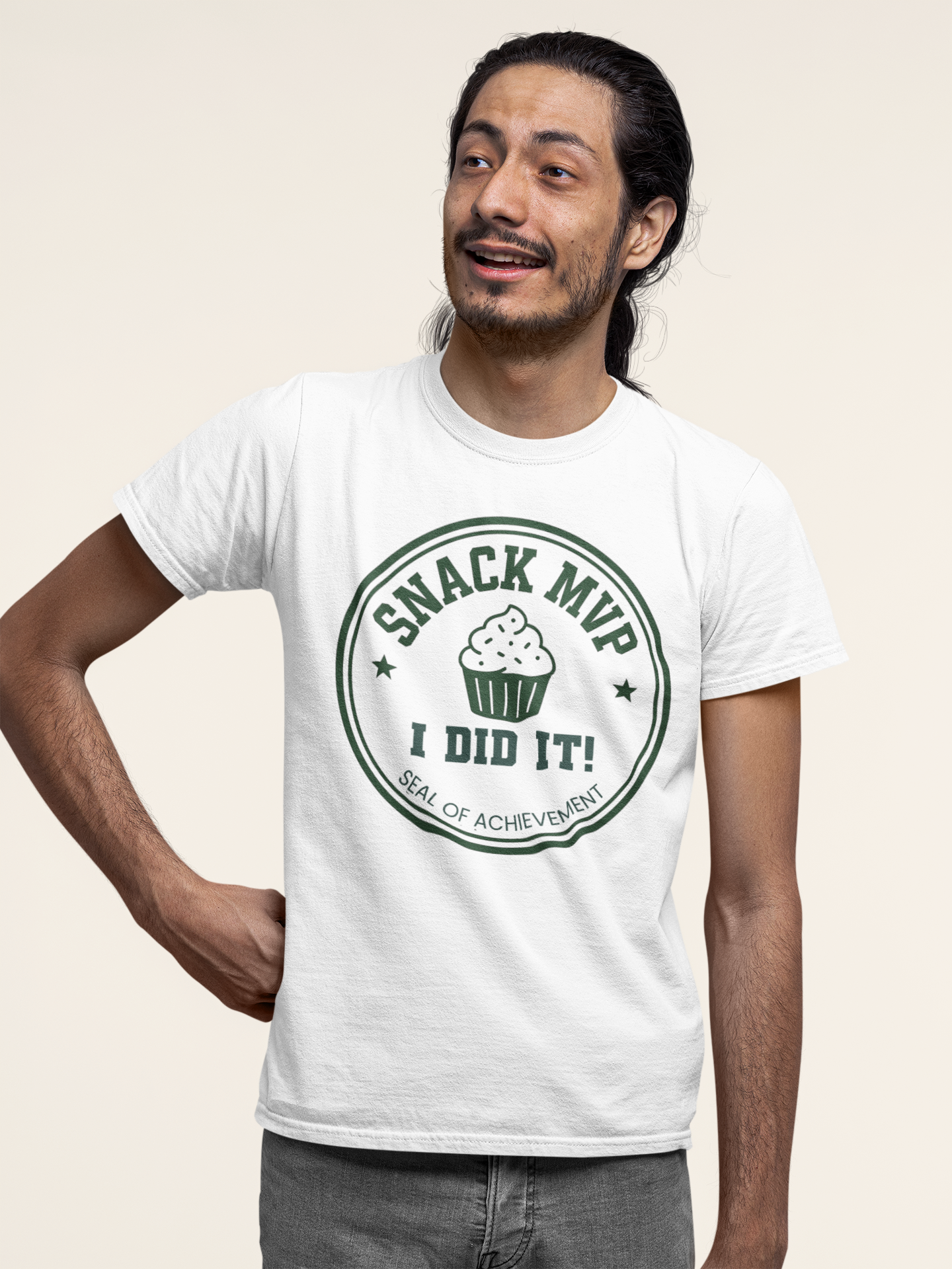 Man wearing a white t-shirt with a graphic design and text on a beige background