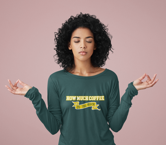 Woman wearing a green long-sleeve shirt with 'How much coffee is too much?' text on a pink background